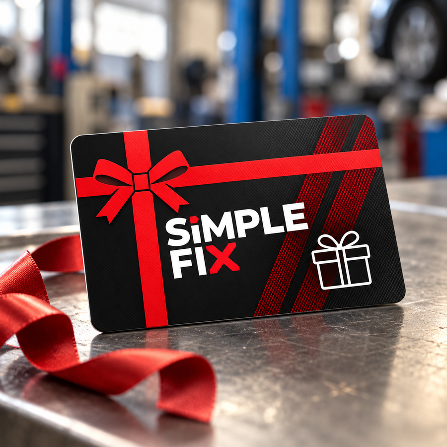 SimpleFix gift card on a workshop bench with red ribbon